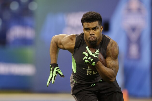 Ohio State running back Ezekiel Elliott runs a drill at the NFL football scouting combine in Saturday, Feb. 27, 2016, in Indianapolis. (AP Photo/Darron Cummings)