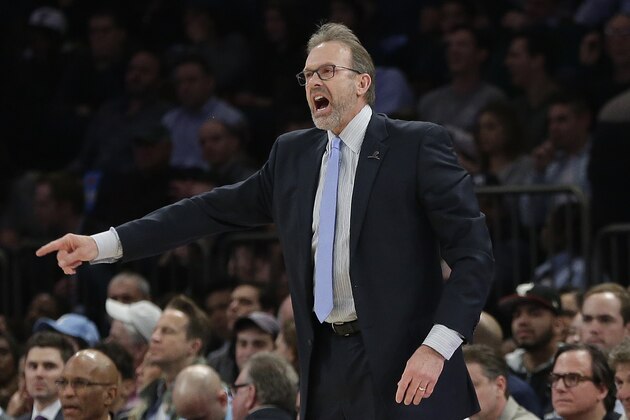 New York Knicks head coach Kurt Rambis calls out to his team during the first half of an NBA basketball game against the Chicago Bulls Thursday, March 24, 2016, in New York. (AP Photo/Frank Franklin II)