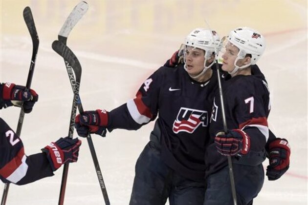 FILE - In this Jan. 5, 2016, file photo, Auston Matthews, left, and Matthew Tkachuk of the United States, celebrate a goal during the 2016 IIHF World Junior Ice Hockey Championship bronze medal game against Sweden in Helsinki, Finland. The United States, Canada and the six other teams playing in the 2016 World Cup of Hockey have named their initial 16-man rosters for the tournament. From Jaromir Jagr to John Klingberg, there's already plenty of debate about who didn't make it.  (Markku Ulander/Lehtikuva via AP, File)    FINLAND OUT. NO THIRD PARTY SALES.