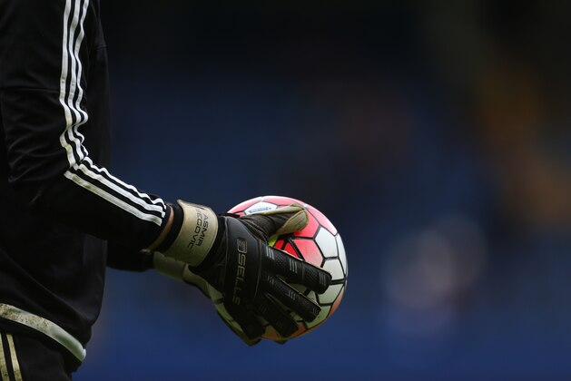 LONDON, ENGLAND - MARCH 19 :  General view as goalkeeper Asmir Begovic of Chelsea holds the ball in his gloves as he warms up before the Barclays Premier League match between Chelsea and West Ham United at Stamford Bridge on March 19, 2016 in London, England.  (Photo by Catherine Ivill - AMA/Getty Images)