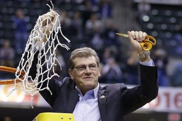 Connecticut head coach Geno Auriemmac celebrates by cutting down the net following the championship game against Syracuse at the women's Final Four in the NCAA college basketball tournament Tuesday, April 5, 2016, in Indianapolis. Connecticut won 82-51. (AP Photo/Michael Conroy)