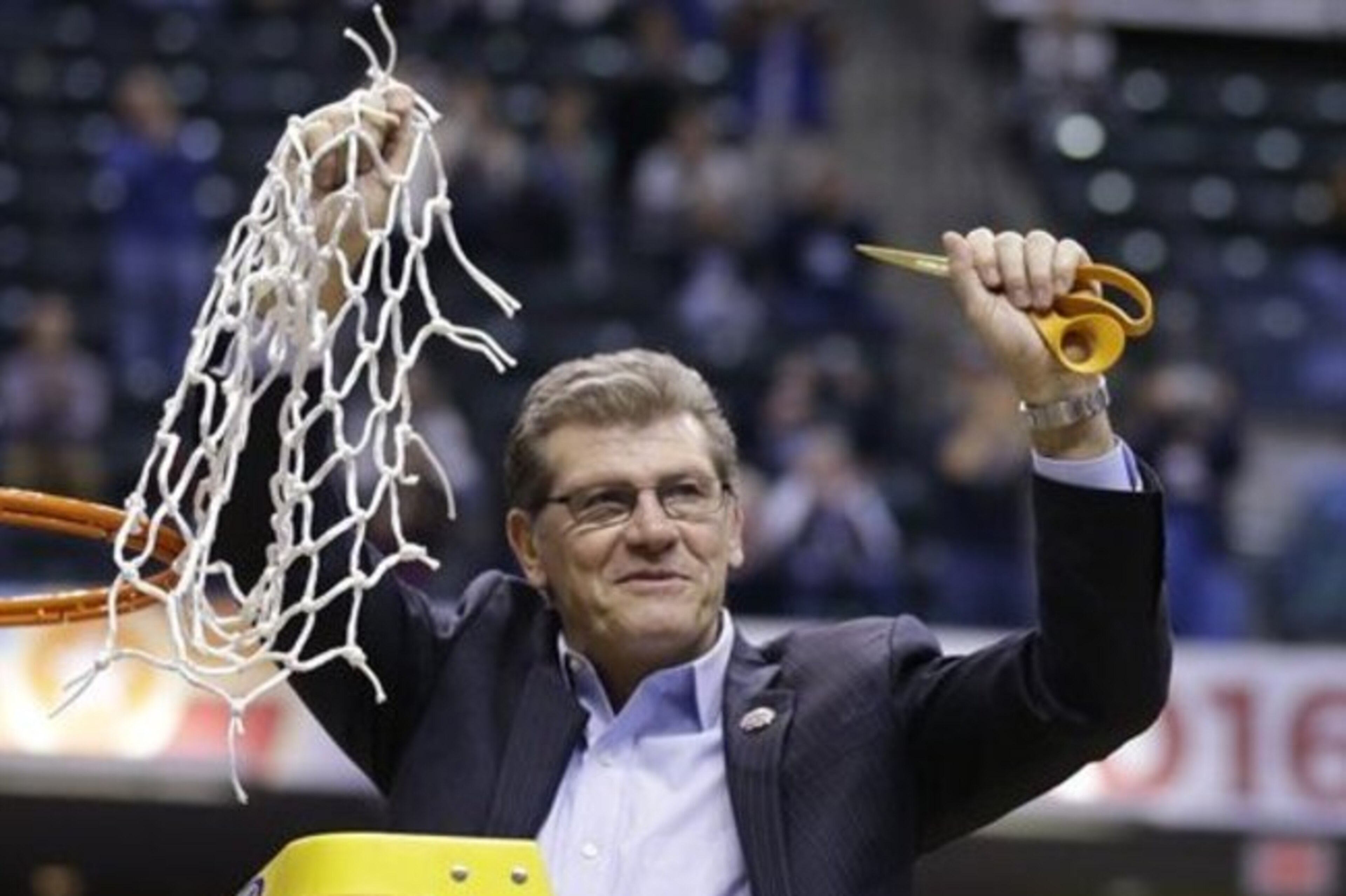 Connecticut head coach Geno Auriemmac celebrates by cutting down the net following the championship game against Syracuse at the women's Final Four in the NCAA college basketball tournament Tuesday, April 5, 2016, in Indianapolis. Connecticut won 82-51. (AP Photo/Michael Conroy) Connecticut head coach Geno Auriemmac celebrates by cutting down the net following the championship game against Syracuse at the women's Final Four in the NCAA college basketball tournament Tuesday, April 5, 2016, in Indianapolis. Connecticut won 82-51. (AP Photo/Michael Conroy)