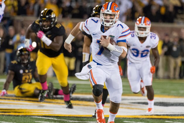 Florida quarterback Will Grier runs upfield during the second half of an NCAA college football game, Saturday, Oct. 10 2015, in Columbia, Mo. Florida won the game 21-3. (AP Photo/L.G. Patterson)