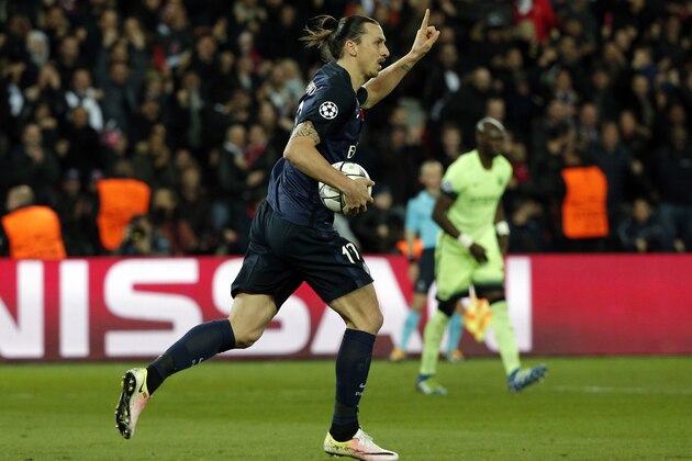 PSG's Zlatan Ibrahimovic holds the ball after scoring during the Champions League quarterfinal first leg soccer match between PSG and Manchester City at the Parc des Princes stadium in Paris, Wednesday, April 6, 2016. (AP Photo/Thibault Camus)