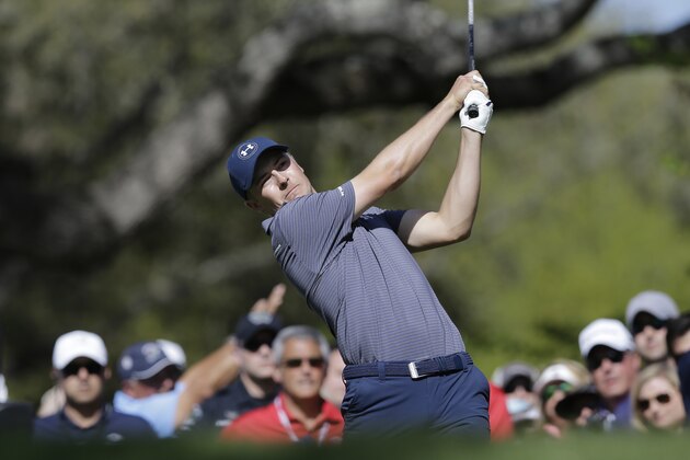 Jordan Spieth hits his tee shot on the eighth hole during round-robin play against Jamie Donaldson at the Dell Match Play Championship golf tournament at Austin County Club, Friday, March 25, 2016, in Austin, Texas. (AP Photo/Eric Gay)