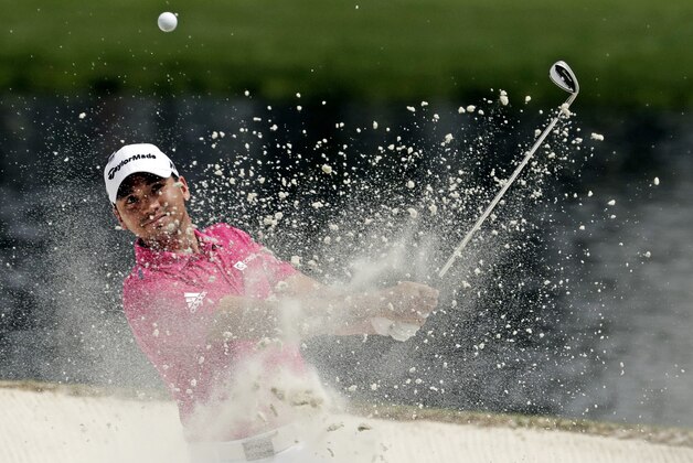 Jason Day, of Australia, hits out of a bunker on the sixth hole during the par three competition at the Masters golf tournament Wednesday, April 6, 2016, in Augusta, Ga. (AP Photo/Charlie Riedel)