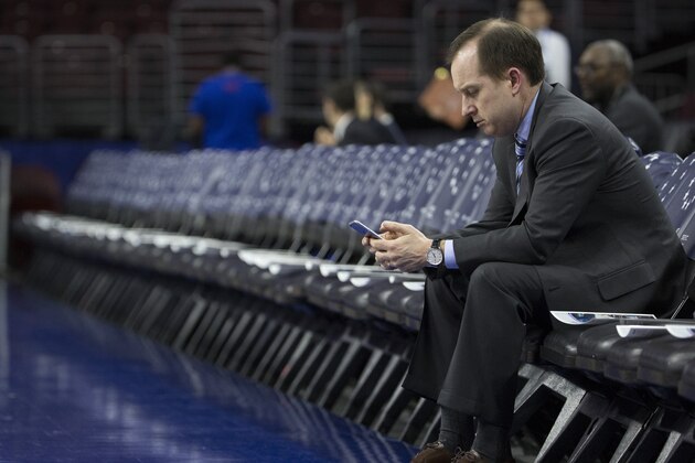 PHILADELPHIA, PA - FEBRUARY 10: Philadelphia 76ers general manager Sam Hinkie looks down at his phone prior to the game against the Sacramento Kings on February 10, 2016 at the Wells Fargo Center in Philadelphia, Pennsylvania. NOTE TO USER: User expressly acknowledges and agrees that, by downloading and or using this photograph, User is consenting to the terms and conditions of the Getty Images License Agreement. (Photo by Mitchell Leff/Getty Images)