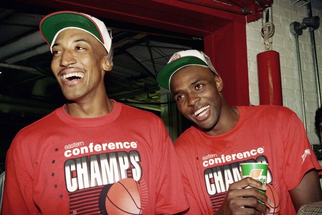 Chicago Bulls Scottie Pippen, left, and Horace Grant are all smiles as they wait their turn at the interview area after a game against the New York Knicks, Friday, June 5, 1993, Chicago, Ill. Chicago won game six of the Eastern Conference Finals 96-88 to win the series 4-2. (AP Photo/Fred Jewell)