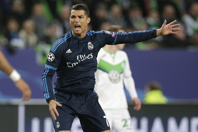 Real Madrid's Cristiano Ronaldo argues a referee decision during the Champions League first leg quarterfinal soccer match between VfL Wolfsburg and Real Madrid in Wolfsburg, Germany, Wednesday, April 6, 2016. (AP Photo/Michael Sohn)