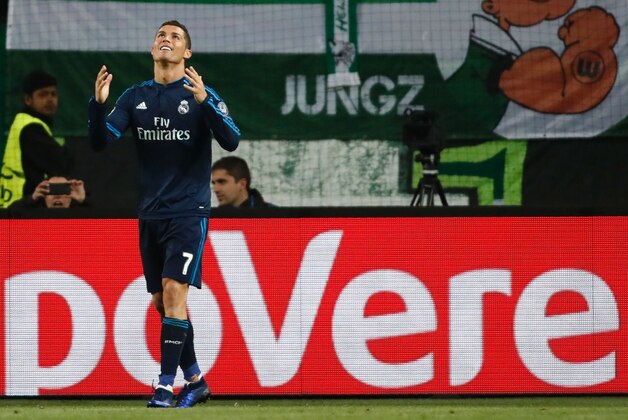 Real Madrid's Portuguese forward Cristiano Ronaldo reacts to a missed chance during the UEFA Champions League quarter-final, first-leg football match between VfL Wolfsburg and Real Madrid on April 6, 2016 in Wolfsburg, northern Germany.  / AFP / ODD ANDERSEN        (Photo credit should read ODD ANDERSEN/AFP/Getty Images)