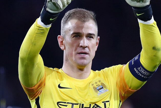 PARIS, FRANCE - APRIL 06:  Joe Hart of Manchester City applauds the away supporters after his team's 2-2 draw in the UEFA Champions League Quarter Final First Leg match between Paris Saint-Germain and Manchester City at Parc des Princes on April 6, 2016 in Paris, France.  (Photo by Clive Rose/Getty Images)