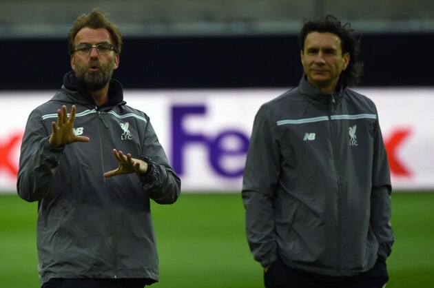 Liverpool's German head coach Jurgen Klopp (L) and Liverpool's Serbian assistant manager Zeljko Buvac (R) oversee a training session on the eve of the UEFA Europe League quarter-final, first-leg football match Borussia Dortmund vs FC Liverpool in Brackel near Dortmund, western Germany on April 6, 2016. / AFP / PATRIK STOLLARZ        (Photo credit should read PATRIK STOLLARZ/AFP/Getty Images)