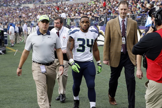 Seattle Seahawks running back Thomas Rawls (34) comes off the field after an injury during the first half an NFL football game against the Baltimore Ravens, Sunday, Dec. 13, 2015, in Baltimore. (AP Photo/Patrick Semansky)