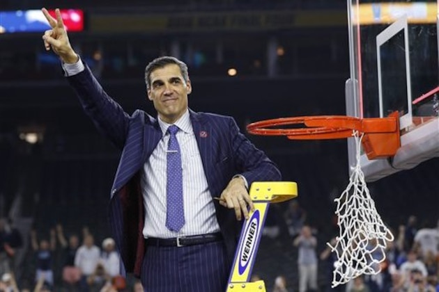 Villanova head coach Jay Wright waved to fans after the NCAA Final Four tournament college basketball championship game against North Carolina, Monday, April 4, 2016, in Houston. Villanova won 77-74. (AP Photo/David J. Phillip)