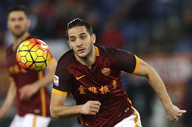 Roma’s Kostas Manolas wears the team jersey bearing a Chinese writing which reads: