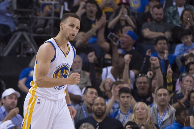 April 3, 2016; Oakland, CA, USA; Golden State Warriors guard Stephen Curry (30) celebrates after making a three-point basket against the Portland Trail Blazers during the second quarter at Oracle Arena. Mandatory Credit: Kyle Terada-USA TODAY Sports