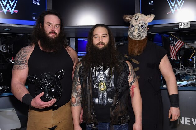 NEW YORK, NY - MARCH 29:  WWE Superstars Braun Strowman, Bray Wyatt and Erick Rowan ring The New York Stock Exchange Opening Bell in honor of WrestleMania 32  at New York Stock Exchange on March 29, 2016 in New York City.  (Photo by Jamie McCarthy/Getty Images)