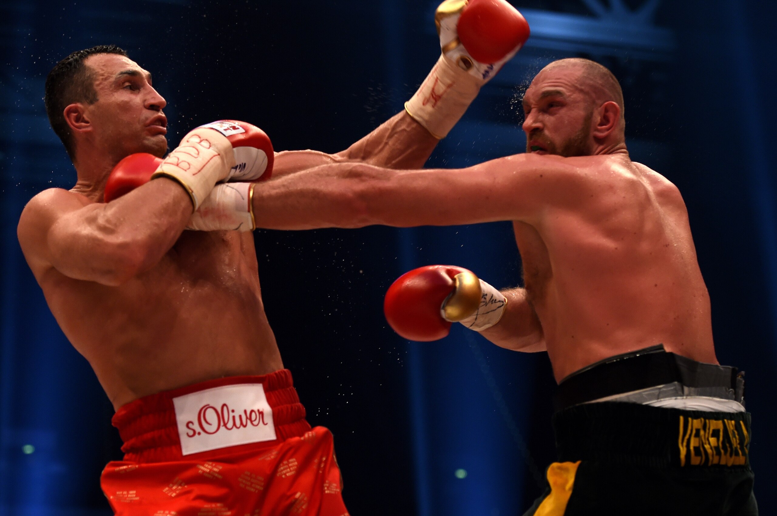 World heavyweight boxing champion Wladimir Klitschko (L) of Ukraine defends against Britain's Tyson Fury during their WBA, IBF, WBO and IBO title bout in Duesseldorf, western Germany, on November 28, 2015. Fury dethroned Klitschko in a 12round decision to become world heavyweight champion. / AFP / PATRIK STOLLARZ (Photo credit should read PATRIK STOLLARZ/AFP/Getty Images) World heavyweight boxing champion Wladimir Klitschko (L) of Ukraine defends against Britain's Tyson Fury during their WBA, IBF, WBO and IBO title bout in Duesseldorf, western Germany, on November 28, 2015. Fury dethroned Klitschko in a 12round decision to become world heavyweight champion. / AFP / PATRIK STOLLARZ (Photo credit should read PATRIK STOLLARZ/AFP/Getty Images)