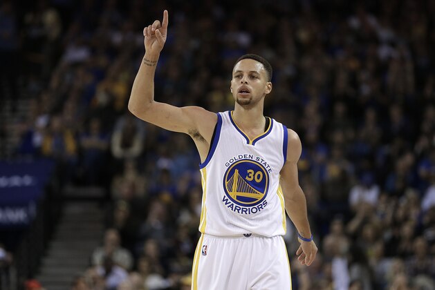 Golden State Warriors' Stephen Curry celebrates a score during the second half of an NBA basketball game against the Portland Trail Blazers Sunday, April 3, 2016, in Oakland, Calif. (AP Photo/Ben Margot)