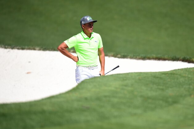 US golfer Rickie Fowler reacts after playing a shot during Round 1 of the 80th Masters Golf Tournament at the Augusta National Golf Club on April 7, 2016, in Augusta, Georgia.

 / AFP / Jim Watson        (Photo credit should read JIM WATSON/AFP/Getty Images)