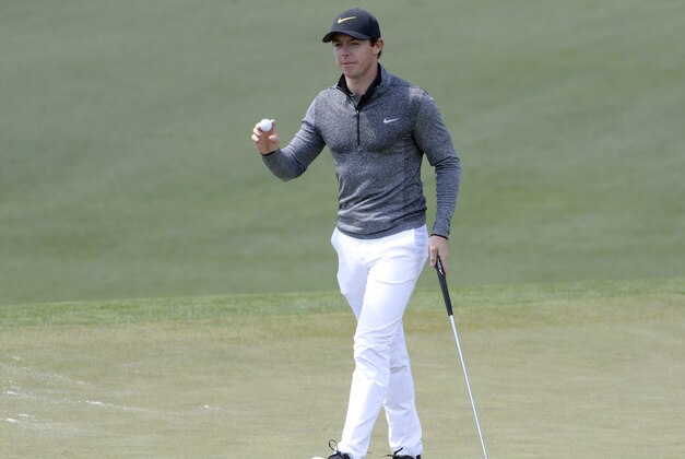 Apr 7, 2016; Augusta, GA, USA; Rory McIlroy waves to the crowd after putting on the 2nd green during the first round of the 2016 The Masters golf tournament at Augusta National Golf Club. Mandatory Credit: Michael Madrid-USA TODAY Sports