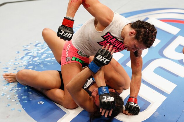 LAS VEGAS, NV - SEPTEMBER 27: (Top) Cat Zingano punches Amanda Nunes in their women's bantamweight fight during the UFC 178 event inside the MGM Grand Garden Arena on September 27, 2014 in Las Vegas, Nevada. (Photo by Josh Hedges/Zuffa LLC/Zuffa LLC via Getty Images) LAS VEGAS, NV - SEPTEMBER 27: (Top) Cat Zingano punches Amanda Nunes in their women's bantamweight fight during the UFC 178 event inside the MGM Grand Garden Arena on September 27, 2014 in Las Vegas, Nevada. (Photo by Josh Hedges/Zuffa LLC/Zuffa LLC via Getty Images)