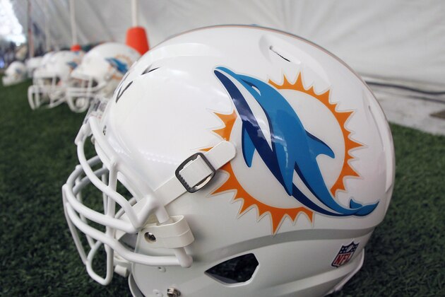 DAVIE, FL - MAY 03:  The Miami Dolphins new logo is displayed on a helmet during rookie camp on May 3, 2013 at the Miami Dolphins training facility in Davie, Florida.  (Photo by Joel Auerbach/Getty Images)