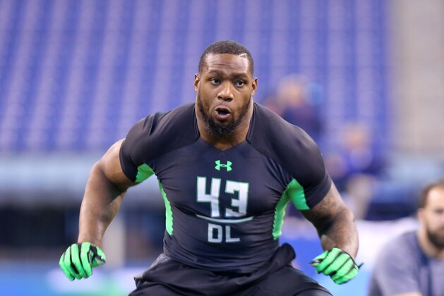 Baylor defensive lineman Shawn Oakman performs a drill at the NFL football scouting combine Sunday, Feb. 28, 2016, in Indianapolis. (AP Photo/Gregory Payan)