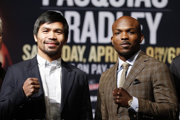 Manny Pacquiao, from the Philippines, left, poses with Timothy Bradley, Wednesday, April 6, 2016, in Las Vegas. The two are scheduled to fight in a welterweight title fight Saturday in Las Vegas. (AP Photo/John Locher)