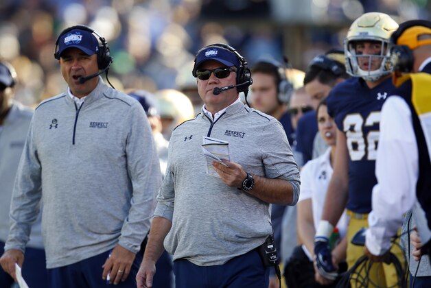 Notre Dame head coach Brian Kelly watches his team play against Navy during the first half of an NCAA college football game, Saturday, Oct. 10, 2015, in South Bend, Ind. (AP Photo/Jeff Haynes)