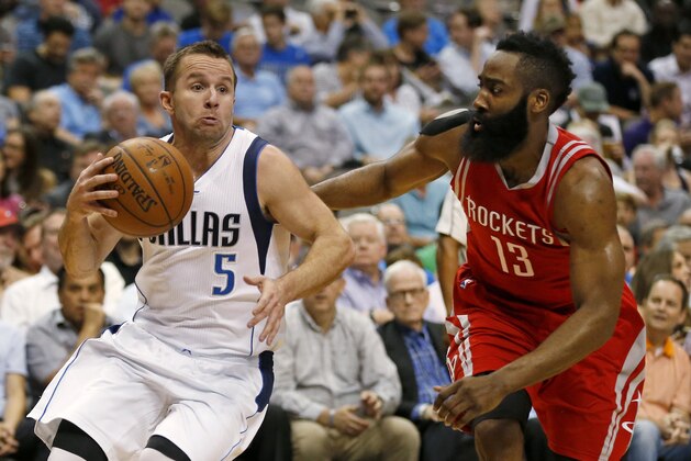 Dallas Mavericks guard J.J. Barea (5) drives as Houston Rockets guard James Harden (13) defends during the second half of an NBA basketball game, Wednesday, April 6, 2016, in Dallas. The Mavericks won 88-86. (AP Photo/Ron Jenkins)