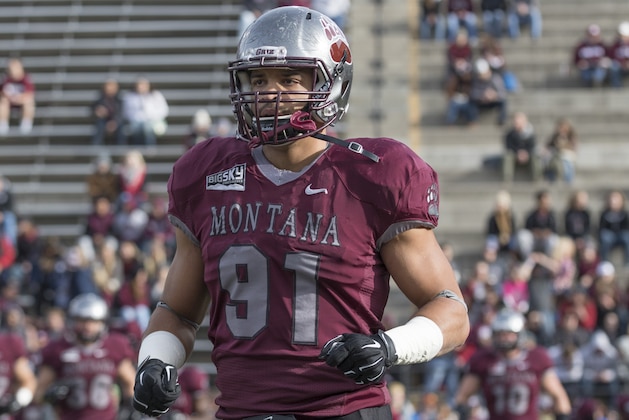 Montana defensive end Tyrone Holmes (91) warms up before playing Eastern Washington in an NCAA college football game Saturday, Nov. 14, 2015, in Missoula, Mont. Montana defeated Eastern Washington, 57-16. (AP Photo/Patrick Record)