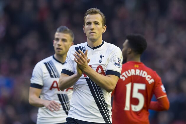 Tottenham's Harry Kane, centre, applauds supporters after his team drew 1-1 in the English Premier League soccer match between Liverpool and Tottenham Hotspur, at Anfield Stadium, in  Liverpool, England, Saturday, April 2, 2016. (AP Photo/Jon Super)