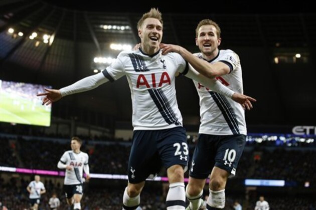 Tottenham's Christian Eriksen, left, celebrates  with Harry Kane after scoring his side’s second goal during the English Premier League soccer match between Manchester City and Tottenham Hotspur's at the Etihad Stadium in Manchester, England, Sunday Feb. 14, 2016. (AP Photo/Jon Super)