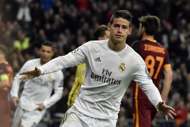 TOPSHOT - Real Madrid's Colombian midfielder James Rodriguez celebrates after scoring  during the UEFA Champions League round of 16, second leg football match Real Madrid FC vs AS Roma at the Santiago Bernabeu stadium in Madrid on March 8, 2016. / AFP / GERARD JULIEN        (Photo credit should read GERARD JULIEN/AFP/Getty Images)