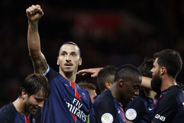 PARIS, FRANCE - SEPTEMBER 22: Zlatan Ibrahimovic of PSG celebrates his goal with teammates during the French Ligue 1 match between Paris Saint-Germain FC (PSG) and EA Guingamp at Parc des Princes stadium on September 22, 2015 in Paris, France. (Photo by Jean Catuffe/Getty Images)
