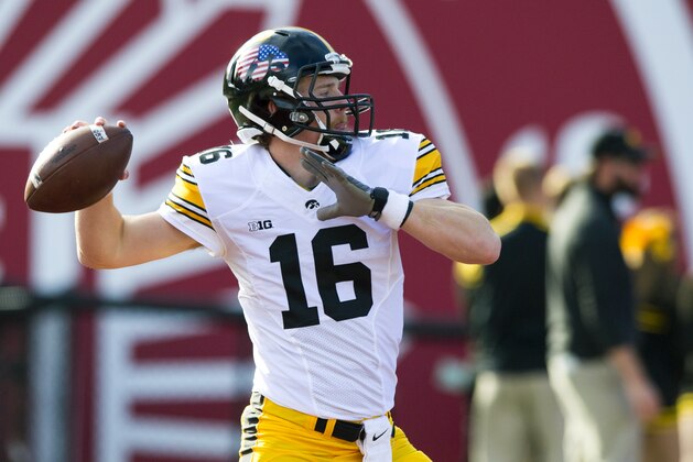 Iowa quarterback C.J. Beathard (16) warms up on the field before the start of an NCAA college football game in Bloomington, Ind., Saturday, Nov. 7, 2015. (AP Photo/Doug McSchooler) Iowa quarterback C.J. Beathard (16) warms up on the field before the start of an NCAA college football game in Bloomington, Ind., Saturday, Nov. 7, 2015. (AP Photo/Doug McSchooler)
