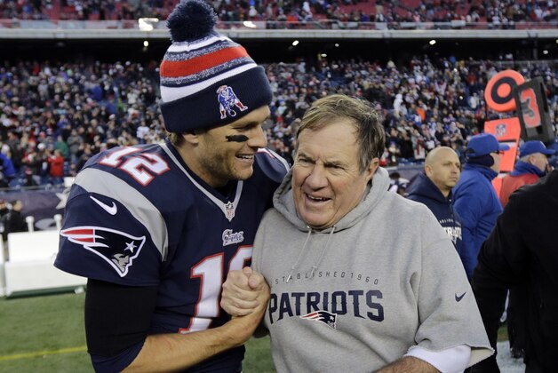 FILE - In this Dec. 14, 2014, file photo, New England Patriots quarterback Tom Brady, left, celebrates with head coach Bill Belichick after defeating the Miami Dolphins 41-13 in an NFL football game in Foxborough, Mass. Super Bowl MVP Tom Brady and Patriots coach Belichick are among tens of thousands of Massachusetts taxpayers on the state treasurer's unclaimed property list.(AP Photo/Charles Krupa, File)