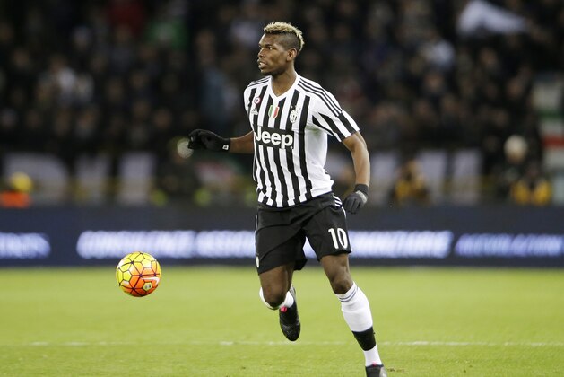 Juventus' Paul Pogba controls the ball during the Serie A soccer match between Bologna and Juventus at the Dall' Ara stadium in Bologna, Italy, Friday, Feb. 19, 2016. (AP Photo/Antonio Calanni)