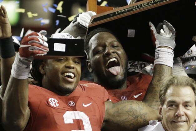 Alabama running back Derrick Henry (2) and Alabama head coach Nick Saban celebrate after the second half of the Southeastern Conference championship NCAA college football game against Florida, Saturday, Dec. 5, 2015, in Atlanta. Alabama won 29.15. (AP Photo/David Goldman)