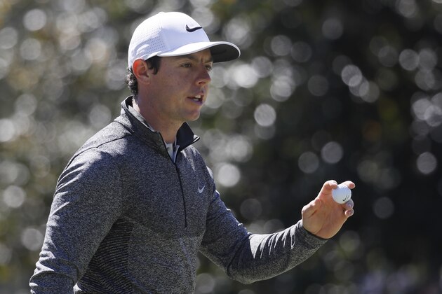 Rory McIlroy, of Northern Ireland, holds up his ball after saving par on the first hole during the second round of the Masters golf tournament Friday, April 8, 2016, in Augusta, Ga. (AP Photo/Chris Carlson)
