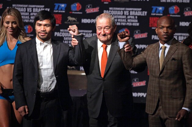Welterweight boxers Manny Pacquiao,(L), and Timothy Bradley Jr.,(R), pose with promoter Bob Arum,(C), during their final news conference at the MGM Grand Hotel & Casino  April 6, 2016 in Las Vegas, Nevada. 
Pacquiao and Timothy Bradley Jr., will meet for their third fight on April 9 at the MGM Grand Garden Arena in Las Vegas. / AFP / John GURZINSKI        (Photo credit should read JOHN GURZINSKI/AFP/Getty Images)