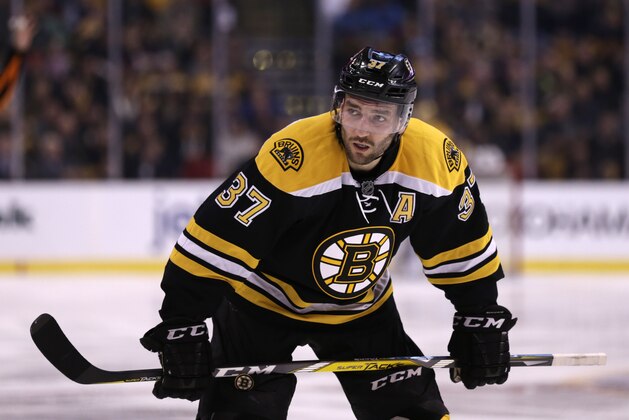Boston Bruins center Patrice Bergeron (37) during the second period of an NHL hockey game in Boston, Tuesday, April 5, 2016. (AP Photo/Charles Krupa)