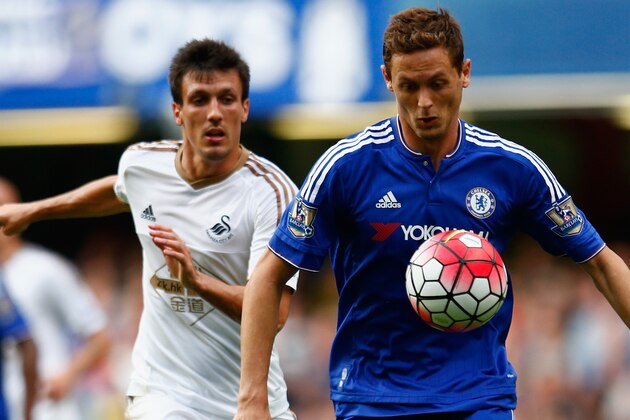 LONDON, ENGLAND - AUGUST 08: Nemanja Matic of Chelsea and Jack Cork of Swansea City compete for the ball during the Barclays Premier League match between Chelsea and Swansea City at Stamford Bridge on August 8, 2015 in London, England.  (Photo by Julian Finney/Getty Images)