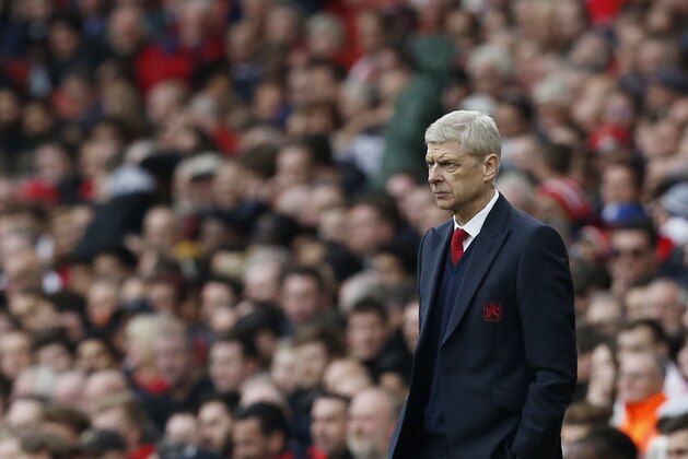 Arsenal's French manager Arsene Wenger looks on during the English Premier League football match between Arsenal and Watford at the Emirates Stadium in London on April 2, 2016.  / AFP / Ian Kington / RESTRICTED TO EDITORIAL USE. No use with unauthorized audio, video, data, fixture lists, club/league logos or 'live' services. Online in-match use limited to 75 images, no video emulation. No use in betting, games or single club/league/player publications.  /         (Photo credit should read IAN KINGTON/AFP/Getty Images)