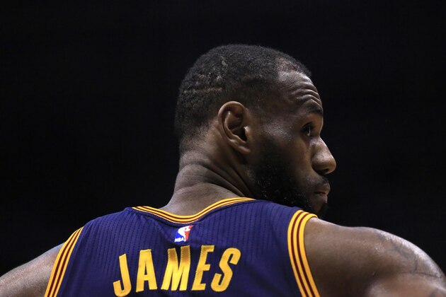 Cleveland Cavaliers forward LeBron James takes a moment during a break in play against the Milwaukee Bucks during the first half of an NBA basketball game Tuesday, April 5, 2016, in Milwaukee. (AP Photo/Darren Hauck) Cleveland Cavaliers forward LeBron James takes a moment during a break in play against the Milwaukee Bucks during the first half of an NBA basketball game Tuesday, April 5, 2016, in Milwaukee. (AP Photo/Darren Hauck)