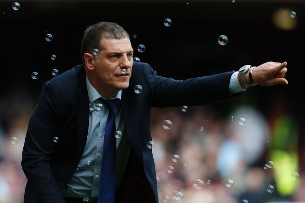 TOPSHOT - West Ham United's Croatian manager Slaven Bilic shouts instructions to his players from the touchline during the English Premier League football match between West Ham United and Arsenal at The Boleyn Ground in Upton Park, in east London on April 9, 2016. / AFP / Ian Kington / RESTRICTED TO EDITORIAL USE. No use with unauthorized audio, video, data, fixture lists, club/league logos or 'live' services. Online in-match use limited to 75 images, no video emulation. No use in betting, games or single club/league/player publications. / (Photo credit should read IAN KINGTON/AFP/Getty Images) TOPSHOT - West Ham United's Croatian manager Slaven Bilic shouts instructions to his players from the touchline during the English Premier League football match between West Ham United and Arsenal at The Boleyn Ground in Upton Park, in east London on April 9, 2016. / AFP / Ian Kington / RESTRICTED TO EDITORIAL USE. No use with unauthorized audio, video, data, fixture lists, club/league logos or 'live' services. Online in-match use limited to 75 images, no video emulation. No use in betting, games or single club/league/player publications. / (Photo credit should read IAN KINGTON/AFP/Getty Images)