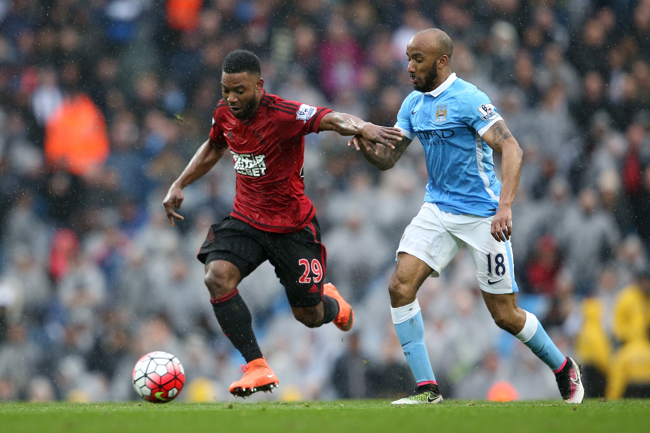 MANCHESTER, ENGLAND - APRIL 09: Stephane Sessegnon of West Bromwich Albion and Fabian Delph of Manchester City compete for the ball during the Barclays Premier League match between Manchester City and West Bromwich Albion at the Etihad Stadium on April 9, 2016 in Manchester, England. (Photo by Jan Kruger/Getty Images) MANCHESTER, ENGLAND - APRIL 09: Stephane Sessegnon of West Bromwich Albion and Fabian Delph of Manchester City compete for the ball during the Barclays Premier League match between Manchester City and West Bromwich Albion at the Etihad Stadium on April 9, 2016 in Manchester, England. (Photo by Jan Kruger/Getty Images)