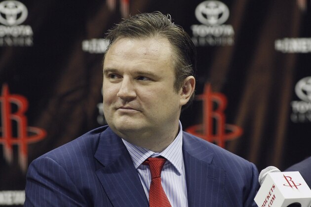 HOUSTON, TX - JULY 13: Houston Rockets general manager Daryl Morey listens as Dwight Howard is officially introduced as a Houston Rocket during a press conference on July 13, 2013 in Houston, Texas.  (Photo by Bob Levey/Getty Images)