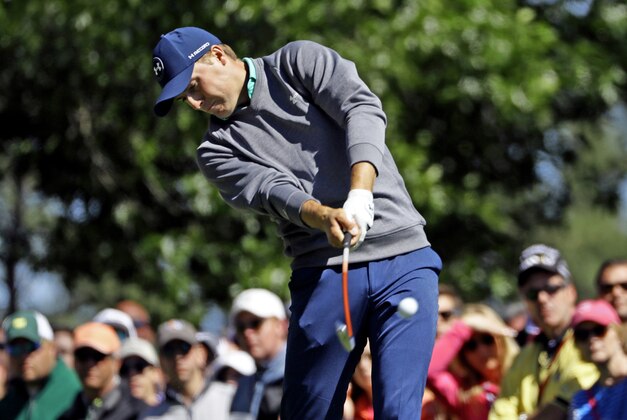 Jordan Spieth tees off on the fourth hole during the third round of the Masters golf tournament Saturday, April 9, 2016, in Augusta, Ga. (AP Photo/Matt Slocum)